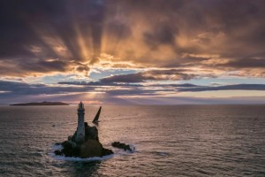 Nikata passes the Fastnet Rock at sunrise in the 2017 edition of the race © Rolex/Carlo Borlenghi