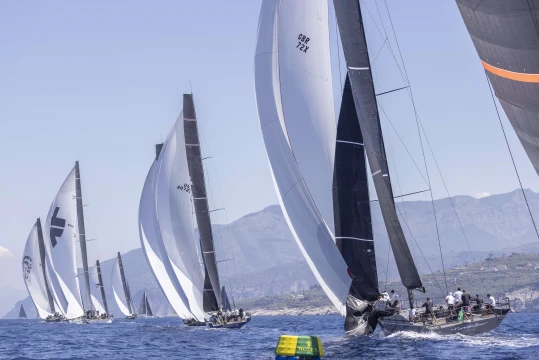 The Maxi Grand Prix class follows the Maxi 100s down the run off Sorrento. Photo: IMA/Studio Borlenghi