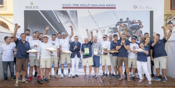 Hap Fauth, Terry Hutchinson and the winner Bella Mente crew at tonight's prizegiving in Sorrento. Photo: IMA/Studio Borlenghi