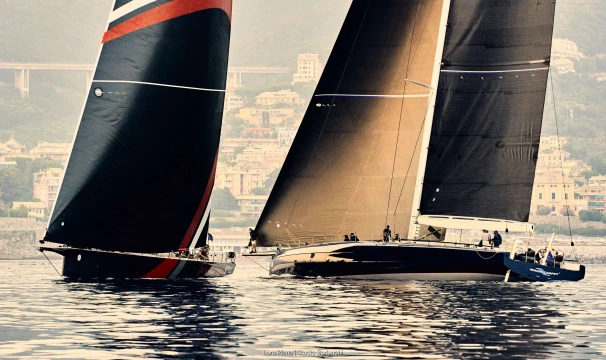 Close crossing within metres of the finish line between SHK Scallywag (left) and Magic Carpet E. Photo: Loro Piana / Studio Borlenghi