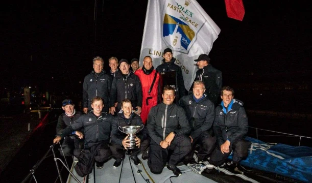 Remon Vos’ Black Jack 100 celebrates Line Honours victory in the Rolex Fastnet Race © Paul Wyeth/RORC