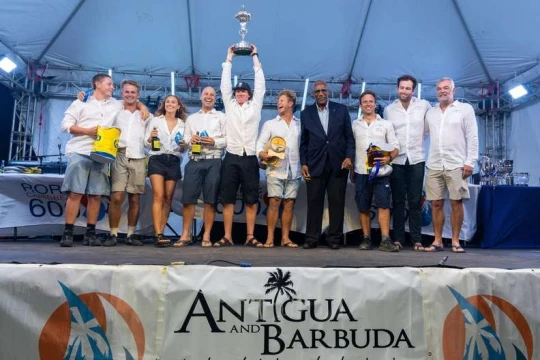 His Excellency, Sir Rodney Williams, Governor General of Antigua & Barbuda presents Leopard 3 with the Overall Winner's Trophy in the 2026 RORC Caribbean 600 © Tim Wright/Photoaction.com